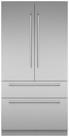 a large stainless steel refrigerator freezer sitting on top of a white counter next to two drawers