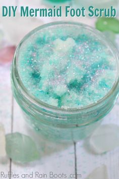 homemade diy mermaid foot scrub in a jar with sea foam on top and text overlay