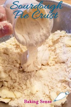 someone mixing batter in a bowl with the words sourdough pie crust above it