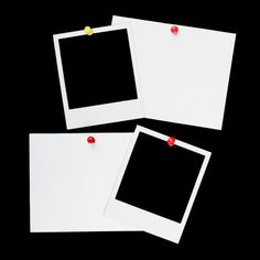 three polaroid frames with push pins attached to them on a black background stock photo