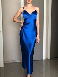 This silk satin slip dress can be worn as a bridesmaid dress, party and date dress and for many other occasions. Made of satin silk. DESCRİPTİON: -Adjustable straps. -Designed for a slim but relaxed fit. -Unlined. İt is a custom made dress, tailored according to your preferences, you can choose the length of the dress and order it with cut on the front. While ordering write your bust, waist and hips measure, so the dress will be made to your size. Please enquire if you're interested in different Silk V-neck Slip Dress For Prom, Summer Evening Slip Dress With Satin Finish, Bias Cut Satin Dress With Spaghetti Straps, Blue Satin V-neck Dress For Party, Satin Finish Spaghetti Strap Evening Dress For Party, Satin Evening Dress With Spaghetti Straps For Bridesmaid, Blue V-neck Silk Dress For Formal Occasions, Bridesmaid Evening Dress With Spaghetti Straps In Satin, Satin Finish Midi Length Slip Dress For Prom