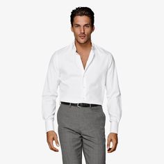 This crisp white button-up is tailored to
 a slim fit from pure Egyptian cotton by the Albini mill, and features a
 curved cutaway collar. Modern White Dress Shirt For Semi-formal Occasions, White Business Casual Shirt With Lapel Collar, White Lapel Collar Shirt For Business Casual, White Dress Shirt With Spread Collar For Office, White Dress Shirt With Button Cuffs For Office, White Business Tops With Lapel Collar, White Button-up Dress Shirt For Office, Classic White Dress Shirt For Office, White Business Top With Lapel Collar