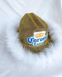 a corona extra hat with white fur around it