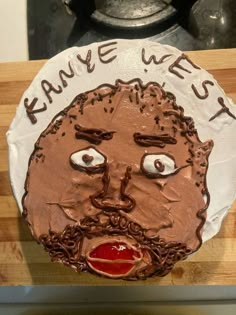 a cake that has been decorated to look like a man's face