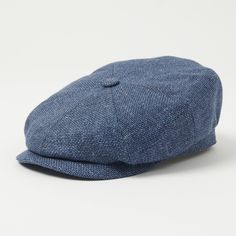 Cut from a fabric made up of a delicate blend of wool and linen, the Ellington flat cap, lends itself well to all seasons of the year. A classic six-panel dome construction adorns the top, while a semi-rigid brim offers essential protection from the sun’s rays. A full cotton lining protects the head, while a cotton sweatband is comfortable for wearing on a daily basis. Wool/linen blend Cotton lining Six-panel dome construction Semi-rigid brim Cotton sweatband Top button Product code:6840103-23 Dome Construction, Blue Flats, Seasons Of The Year, Flat Cap, All Seasons, Linen Blend, The Year, The Sun, Sun