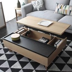 a living room with a gray couch and coffee table