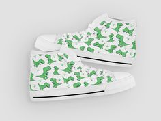 These cute green dinosaur shoes are sure to attrack some attention ! Our custom made shoes will make the best gift for any occasion! All of our sneakers are custom-made-to-order and handcrafted to the highest quality standards Check out more of our footwear here: https://www.etsy.com/shop/unicornshoesshop/ Product Name: Green Dinosaur Shoes | Dinosaur Sneakers | Cute Dinosaur Shoes, Custom High Tops Sneakers For Adults Women Men Girls & Boys Product Features; ▶ Full canvas double sided print Converse Painting Ideas High Tops, Playful Green Sneakers With Rubber Sole, Playful Green Round Toe Sneakers, Dinosaur Sneakers, Cute Green Dinosaur, Dino Room, Dinosaur Shoes, Shoe Painting, Sneakers Cute