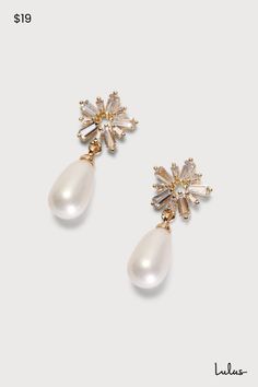 The finishing touch to all your best looks is the Lulus Pearl-fectly Pretty Gold Rhinestone Pearl Drop Earrings! These understated (yet eye-catching) earrings feature a glowing faux pearl teardrop that falls from baguette-cut rhinestones arranged to form a stud with a star-inspired shape. Post backs. 1'' Long. 40% Brass, 30% Cubic Zirconia, 30% Plastic. Imported. Lulus | Pearl-fectly Pretty Gold Rhinestone Pearl Drop Earrings. Teardrop Pearl Earrings, Lulu Fashion, Faux Pearl Earrings, Gold Rhinestone, Baguette Cut, Pearl Drop Earrings, Pearl Drop, Wedding Shop, Baguette