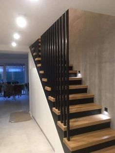 the stairs are made of wood and metal