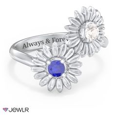 Modern and fresh, this beautiful bypass ring features two blooming sunflowers that sparkle with gemstone centers. Personalize with your choice of genuine birthstones or Brilliance cubic zirconia and create the perfect gift for someone special. Design this ring in sterling silver, yellow, white, or rose gold, and add an engraving along the inside of the band for a personal touch. Flower Shaped Birthstone Ring For Anniversary, Flower-shaped Anniversary Rings With Accent Stones, Flower-shaped Rings With Accent Stones For Anniversary, Flower Shaped Rings With Accent Stones For Anniversary, Diamond Flower Ring With Birthstone For Anniversary, Anniversary Rings With Sunflower Design, Sunflower Design Jewelry For Mother's Day Anniversary, Sunflower Jewelry For Anniversary And Mother's Day, Adjustable Gemstone Flower Ring For Anniversary