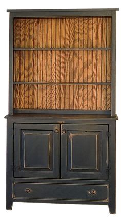 an old fashioned bookcase with two doors and drawers on the front, made out of wood