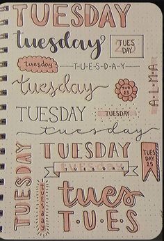 a spiral notebook with writing on it and the words tuesday written in cursive