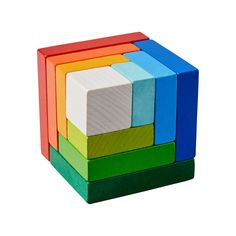 a multicolored wooden block toy sitting on top of each other