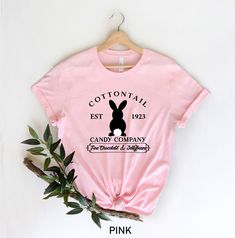 Cottontail Candy Company Easter, Easter Shirt For Woman, Cute Easter, Kids Easter Tee, Easter Family Shirt, Easter Day, Easter Matching Tees Welcome to AuroraConceptDesign! ❤️ 👉🏻 PROCESSING TIME: - 3-5 business days. - Please contact with us if there is a rush order. 👉🏻 DELIVERY TIME: - Standard Shipping:  3-5 business days - Expedited Shipping  1-3 business days 👉🏻 CARE INSTRUCTIONS: - Machine wash cold and tumble dry low.  - Do not iron directly onto the design. - Do not bleach. We offer Easter Tees, Candy Companies, Easter Prints, Xmas Tees, Easter Birthday, Merry Christmas Shirts, Cute Easter, Matching Tees, Shirts For Teens