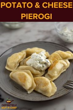 potato and cheese pierogi on a plate with a fork