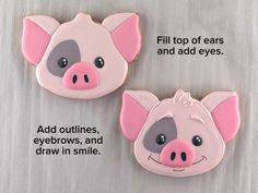 two decorated cookies with pink and gray pig faces on top of each cookie, one has an eye patch