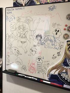 a white board with some drawings on it