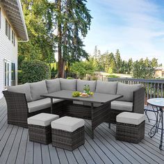 an outdoor patio furniture set on a deck