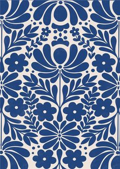 a blue and white tile with flowers on it