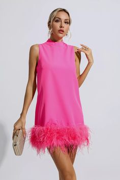 Add the adorable must-have Hope Pink Feather Mini Dress! The sleeveless straight style design with a half-high collar adds a fashionable sense of luxury. The feathers are dotted under the dress, which looks fluffy and cute. Put on high heels or boots to create a unique look that belongs to you.  Dress Length: Approx 72cm Materials: 70% Polyester, 30% Cotton Gentle Dry Clean Only  Model is 5 ft 7 and wears size S  Colour may vary due to lighting on images. The product images (without model) are c Feather Mini Dress, Glitter Wedding Dress, Bandage Midi Dress, Hot Pink Dresses, Pink Feathers, Floral Shirt Dress, Feather Dress, Puff Sleeve Dresses, Maxi Knit Dress