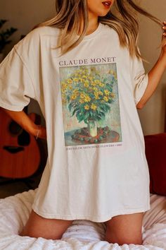 "Looking for the perfect gift for an art or Claude Monet lover? Welcome to Joy of Plants, where we offer a wide selection of unique products inspired by the renowned artist Claude Monet. 🌻 Our Monet Collection includes a variety of items such as Monet art prints on custom canvas totes, ceramic coffee mugs, comfy t-shirts, sweatshirts, hoodies and even personalized journals, wall art and phone cases. Each item features some of the most beautiful and iconic pieces of Monet's artwork, making them Monet T Shirt, Artsy Oversized Graphic T-shirt, Artsy Oversized Graphic Print T-shirt, Oversized Artsy Graphic Print T-shirt, Spring Aesthetic Graphic T-shirt, Spring Aesthetic Graphic Print T-shirt, Oversized Artistic Graphic Print T-shirt, Artistic Oversized T-shirt With Graphic Print, Artsy Relaxed Fit Printed T-shirt