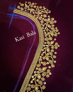 the back side of a purple blouse with gold beading on it and an inscription that reads, kasi bala