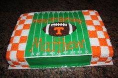 a football themed birthday cake on a table