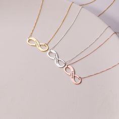 PLEASE READ DESCRIPTION & POLICIES Personalized Infinity Name Necklace in Gold, Rose Gold, or Sterling Silver - Custom Engraved Jewelry for Her - Infinity Symbol Necklace  DESCRITION  Embrace the timeless symbol of infinity with this personalized infinity name necklace, beautifully crafted from nickel-free 925 Sterling Silver. Available in gold-plated, rose gold-plated, and sterling silver finishes, each piece is adorned with a premium 1-micron layer of real 18ct gold for an elegant shine. This custom-engraved necklace features a delicate chain, making it a perfect gift for her that symbolizes endless love and connection.  DETAILS  ✦ Material: 925 Sterling Silver (nickel free)(stamped) ✦ Finish: Gold, Rose Gold, Sterling Silver ✦ Necklace Length: 14" - 20" ✦ Chain Type: Rope (1mm thickness Personalized Infinity Rose Gold Jewelry, Personalized Rose Gold Infinity Jewelry, Valentine's Day Rose Gold Infinity Necklace, Infinity Symbol Necklace, Custom Engraved Necklace, Chain Making, Timeless Symbol, Symbol Necklace, Infinity Symbol