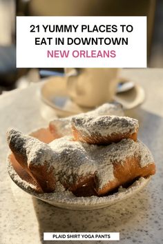 two pastries on a plate with the title 21 yummy places to eat in downtown new orleans