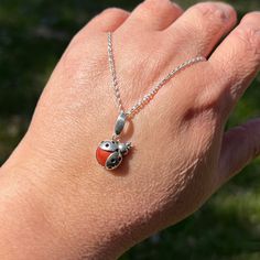 Hop to it with this cute little sterling silver ladybug accenting a vibrant red jasper stone. The lightweight pendant also features a leaf shaped bail, and makes for a choice piece when stacking with other necklaces. Perfect for a nature-lover or anyone looking to add a unique flair to their wardrobe! Overall length: 1 inch (24mm)Overall width: 1/2 inch (13mm) Type: pendant onlyMetal: solid .925 sterling silverGemstone: Chalcedony var. Jasper (N)* * Learn about gemstone enhancement codes. (For r Handmade Sterling Silver Charm Necklaces With Teardrop Pendant, Handmade Sterling Silver Teardrop Charm Necklace, Handmade Sterling Silver Charm Necklace With Teardrop Pendant, Red Nature-inspired Jewelry For Gifts, Red Handmade Sterling Silver Charm Necklace, Red Sterling Silver Teardrop Pendant Jewelry, Red Jasper Stone, Sterling Silver Necklace Pendants, Jasper Stone