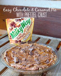 an easy chocolate and caramel pie with pretzel crust is ready to be eaten