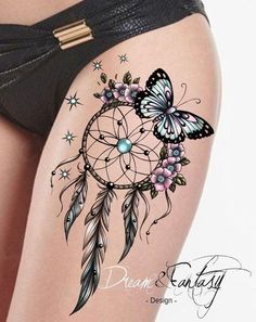 a woman's thigh with tattoos on it and a butterfly flying over the dream catcher