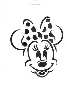 a black and white drawing of a mickey mouse's head with polka dots on it