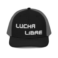 a black and gray trucker hat with the words uccha lubre on it