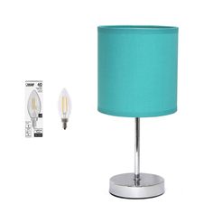 a lamp with a blue shade on it next to a wall charger and plug