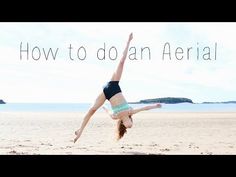 a girl doing a handstand on the beach with text overlay that reads how to do an aerial