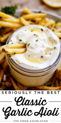 a plate full of fries and dip with the words seriously the best classic garlic aioli