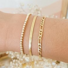 Whether you want a bold or elegant look, the Gold Herringbone Bracelet is your go-to. Its versatile shimmer makes it the perfect accessory for any outing, whether it be your favorite concert, a walk by the beach, or a day shopping with friends it’s sure to make you feel adorable! DETAILS Bracelet length: 6.5" with 1" extender Choose from two materials: 14k gold filled or 18k Brazilian gold filled. Not sure about the difference? 14k gold filled will last longer; 18k Brazilian gold filled is great Affordable Gold Bracelet For Vacation, Cheap Gold Bracelets For Beach, Shopping With Friends, Herringbone Bracelet, Brazilian Gold, Herringbone Necklace, Bracelet Simple, By The Beach, Layered Bracelets