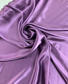 a close up view of a purple fabric