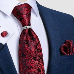 The Clever Collection is one of our best selling tie sets! It features a classic paisley design pattern in red. To add a little pop to your black or blue suit, this set also includes a standard size matching pocket square and cufflinks. As an added bonus, this set also includes tie ring that is covered in meticulously selected crystals in a prong setting and polished to ensure a brilliant shine. Specifications Ties Type: Neck Tie SetSize: One SizeModel Number: JZ04-7148Pattern Type: PaisleyColor Luxury Ties For Semi-formal Occasions, Necktie, Luxury Elegant Patterned Ties, Luxury Semi-formal Gentleman's Ties, Luxury Semi-formal Ties With Pocket Square, Luxury Patterned Ties For Semi-formal Occasions, Mens Fashion Business, Silk Necktie, Tie Set