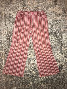 I love these vintage striped pants, they're so retro. They flare a little at the bottom.  Red, pink, white, brown. By the brand Dr. Chouty. Size : 8 kids  Material: cotton and lycra Trendy Striped Pants With Pockets, Vintage Striped Straight Leg Bottoms, Vintage Pink Wide Leg Bottoms, Vintage Pink Wide-leg Bottoms, Retro Cotton Bottoms With Vertical Stripes, Vintage Cotton Bottoms With Vertical Stripes, Retro Red Cotton Pants, Retro Pink Pants With Pockets, Vintage Pink Wide Leg Pants