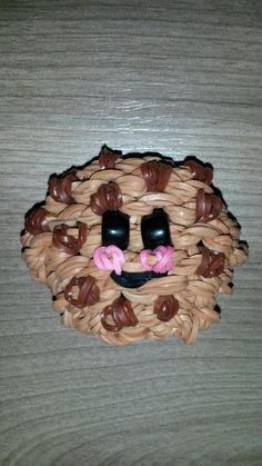 a basket with chocolate candies in the shape of a face