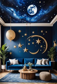 a living room with blue walls and stars painted on the ceiling, while a large moon hangs from the ceiling