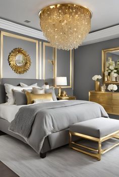 a bedroom with gray walls, gold accents and chandelier above the bed is an ottoman