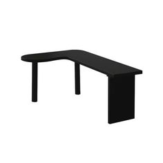 a black table sitting on top of a white floor