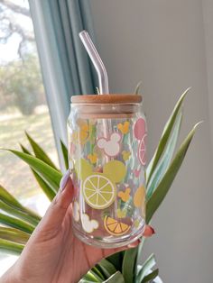 Mickey Ears , pink, green, yellow fruity 16oz Glass Can. The perfect summer cup for cold beverages Cups Cricut, Starbucks Cup Design, Camels Art, Christmas Cups, Projets Cricut, Coffee Cup Design, Cup Designs, Custom Cups, Glass Cups