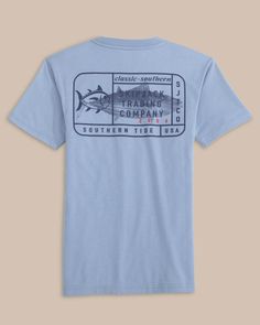 The back view of the Southern Tide Kids Skipjack Trading Co Short Sleeve T-Shirt by Southern Tide - Eternal Blue Father Son Outfits, Womens Matching Sets, Boys Swim Trunks, Size Chart For Kids, Boys Swim, Kids Pants, Swimwear Cover, Pullover Jacket, Sports Shirts