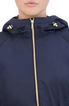 Long commutes and travels abroad are a breeze in an entirely packable rain jacket topped with a protective hood and shaped with a nipped-in drawcord waist. 29" length Front zip closure Drawcord-toggle hood Front snap-welt pockets Drawcord-toggle waist 95% polyester, 5% nylon Machine wash, line dry Imported Solid Weatherproof Windbreaker For Travel, Windproof Hooded Raincoat For Travel, Windproof Nylon Travel Raincoat, Hooded Windproof Raincoat For Travel, Sporty Nylon Raincoat For Travel, Travel Weatherproof Windbreaker, Weatherproof Hooded Raincoat For Travel, Nylon Raincoat For Travel During Rainy Season, Hooded Weatherproof Raincoat For Travel