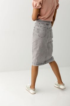 This soft denim skirt has a vintage wash for that lived in look we love. It is made from a quality, stretch denim to ensure a modest and flattering fit. Featuring a wide waistband for extra comfort and easy styling. This skirt was designed with everyday wear in mind and will pair well with just about any casual top in your wardrobe. 75% Cotton 23% Polyester 2% Spandex Wash Cold Gentle Cycle Hang to Dry Low Iron if Needed Model A Height 5'9" | Wearing Size 4 in 26" Length Model B Height 5'6" | We Soft-washed Medium Wash Bottoms For Spring, Spring Medium Wash Soft-washed Bottoms, Spring Soft-washed Medium Wash Bottoms, Mid-rise Washed Denim Skirt For Spring, Trendy Light Wash Denim Skirt, High Rise Washed Skirt For Spring, Spring High Rise Washed Skirt, Spring Mid-rise Washed Skirt, Casual High Waist Washed Denim Skirt