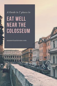 an old town with the words eat well near the colossum